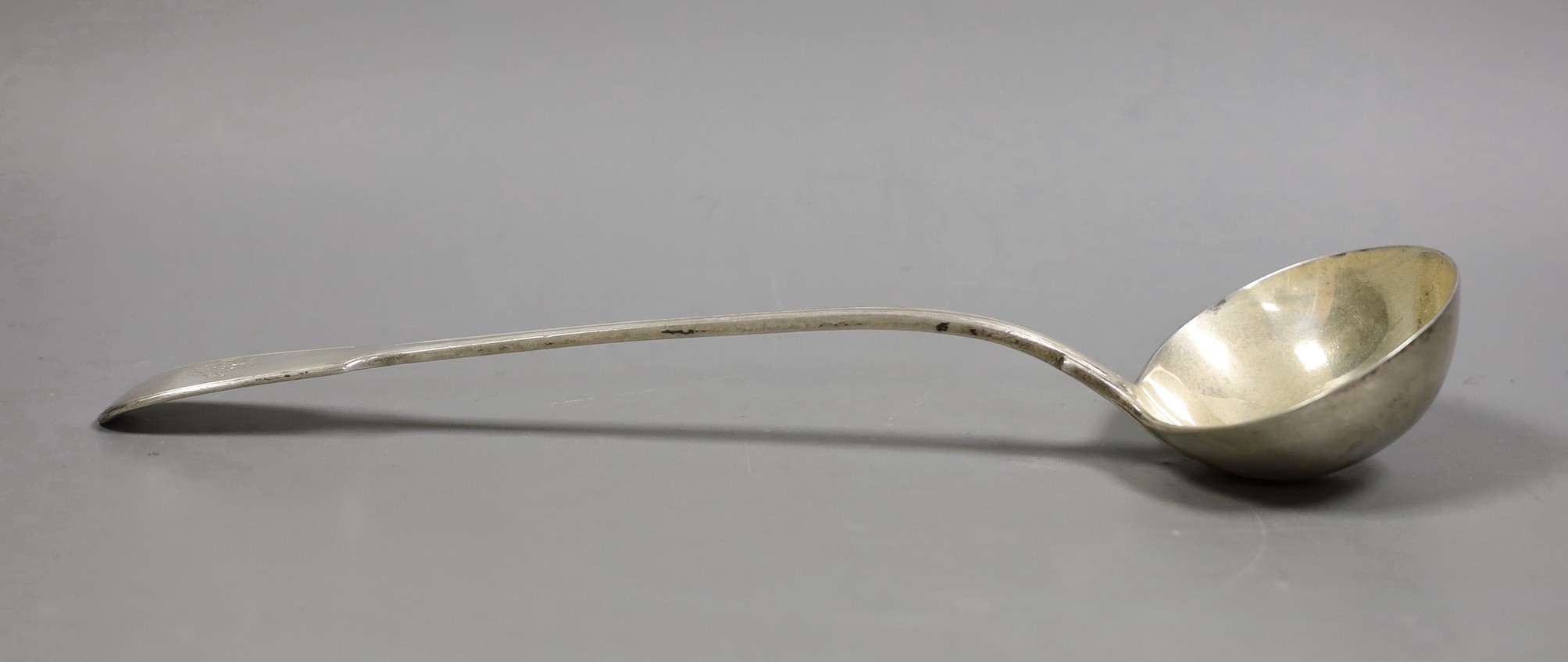 An early Victorian silver fiddle and thread pattern soup ladle, by William Eaton, London, 1845, 34.3cm